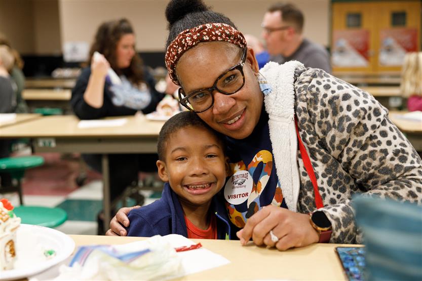 Families enjoying holiday activities